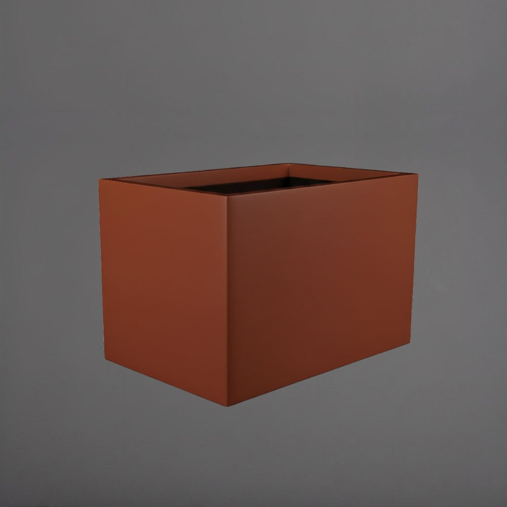 Granada Wide Rectangle Fiberglass Planter in matte terra cotta against gray background.