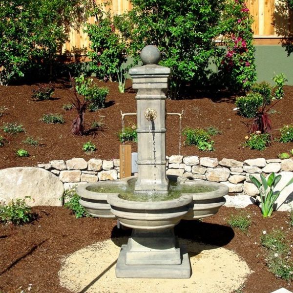 Grand Avignon Courtyard Fountain in action in the backyard.