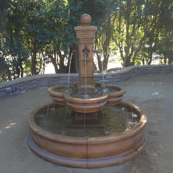 Grand Avignon Courtyard Fountain in action in a pond.