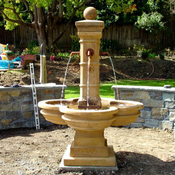 Grand Avignon Courtyard Fountain on ground in the backyard.