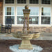 Grand Avignon Courtyard Fountain on white pebbles in action.