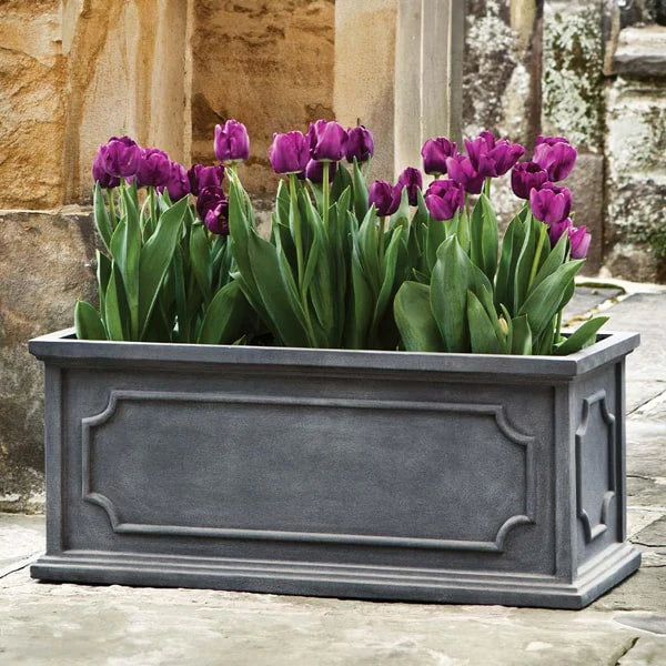 Hampshire Window Box Planter, Large on concrete filled with purple flowers