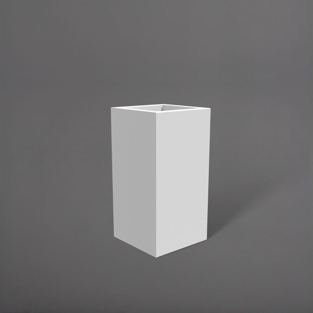 Hollywood Corner Fiberglass Planter in matte bright white against gray background.