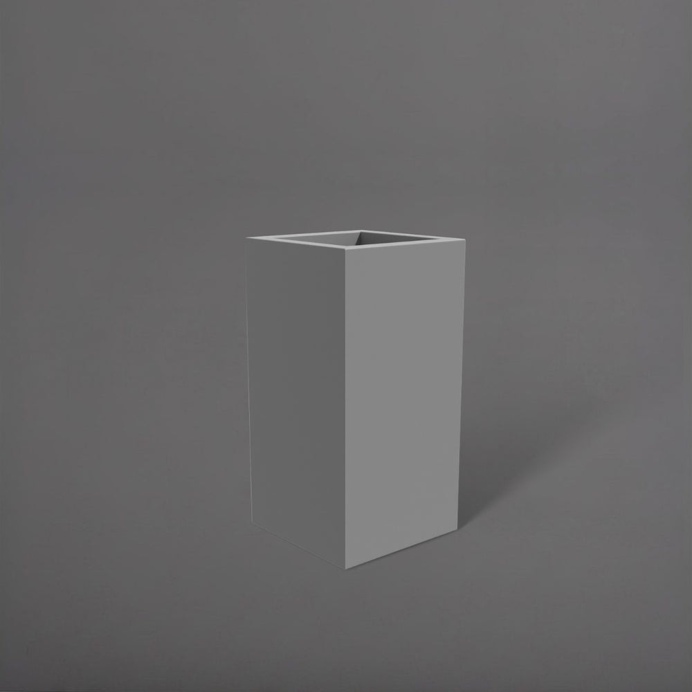 Hollywood Corner Fiberglass Planter in matte cement grey against gray background.