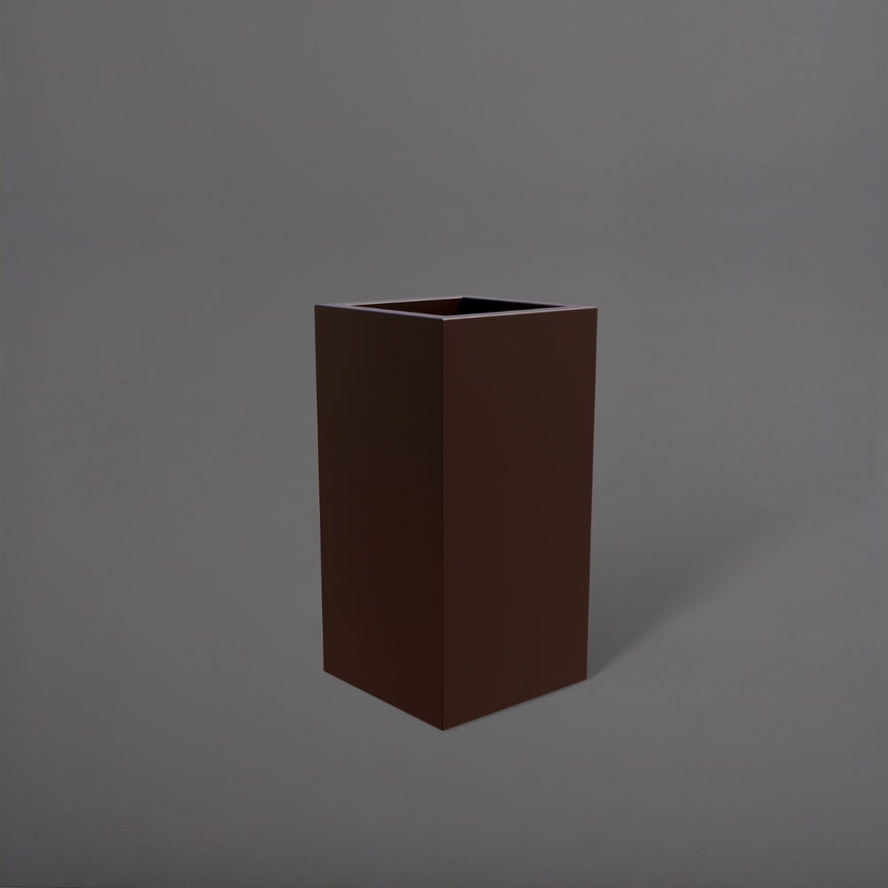 Hollywood Corner Fiberglass Planter in matte dark brown against gray background.