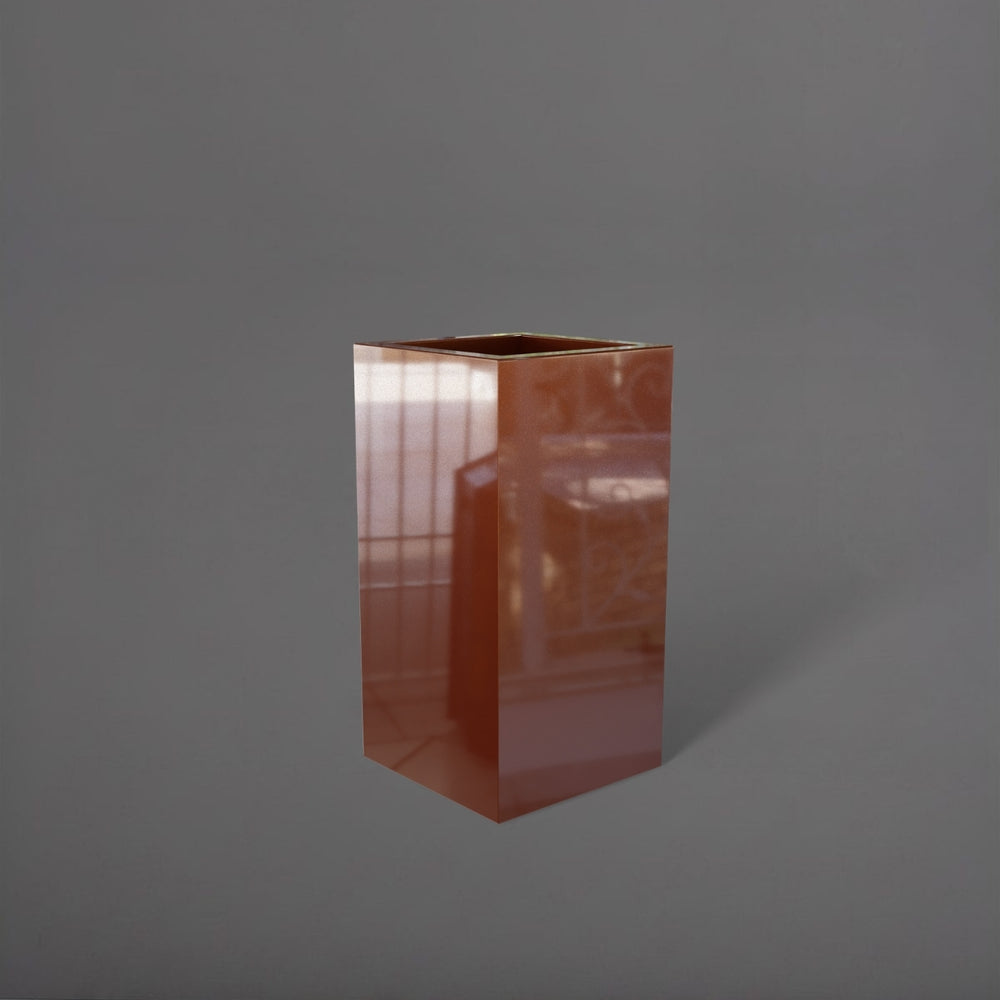 Hollywood Corner Fiberglass Planter in metallic bronze against gray background.