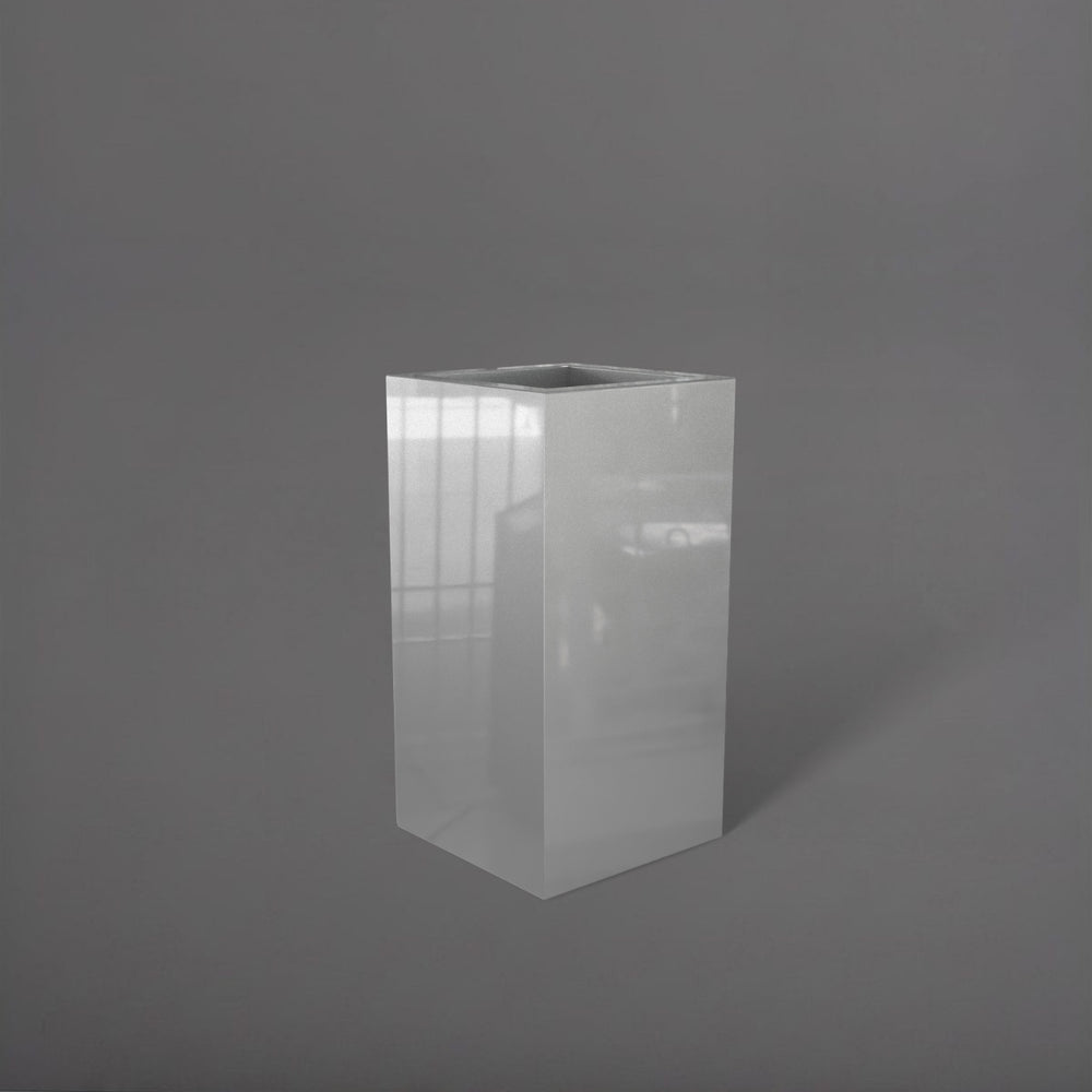 Hollywood Corner Fiberglass Planter in metallic silver against gray background.