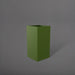 Hollywood Corner Fiberglass Planter in satin green against gray background.