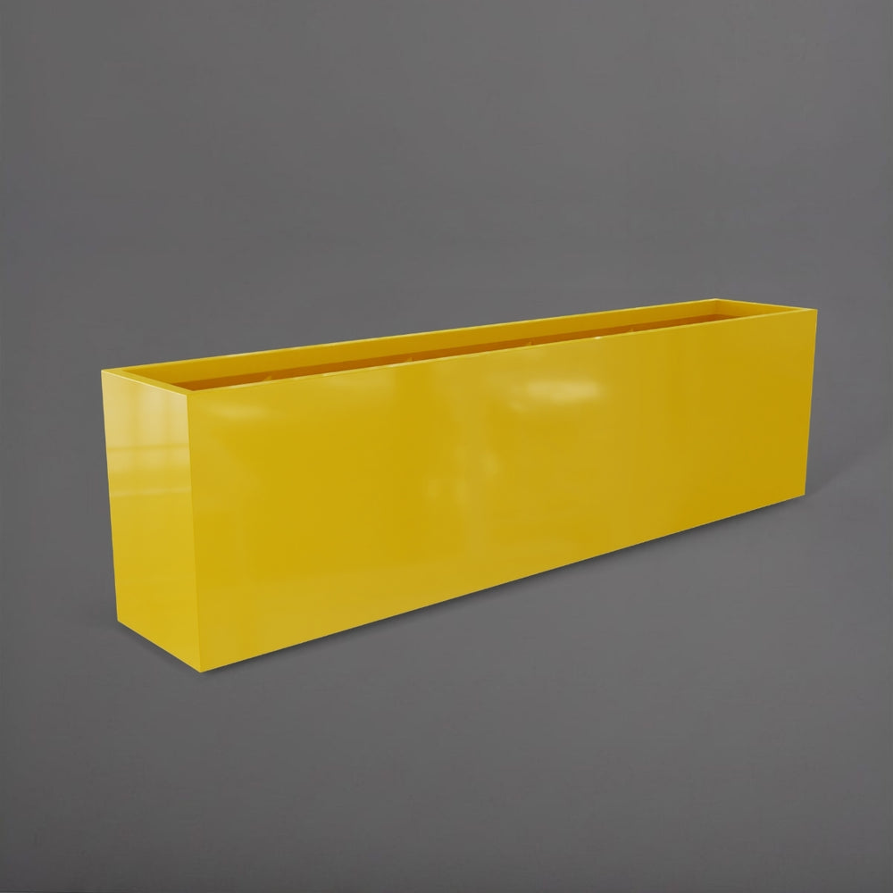 Hudson Extra Long Rectangle Fiberglass Planter in gloss saffron against gray background.