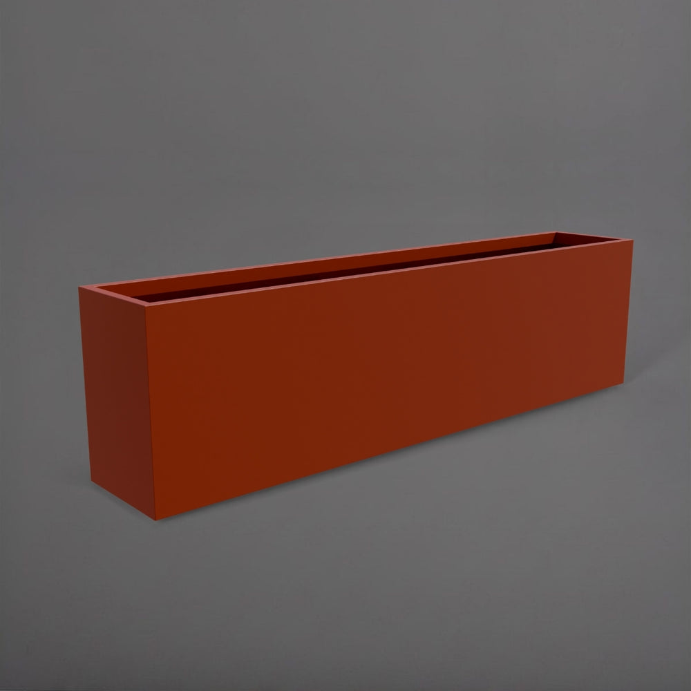 Hudson Extra Long Rectangle Fiberglass Planter in matte terra cotta against gray background.