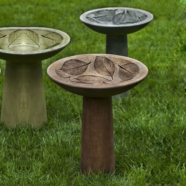 Hydrangea Leaf Birdbath on grass in the backyard