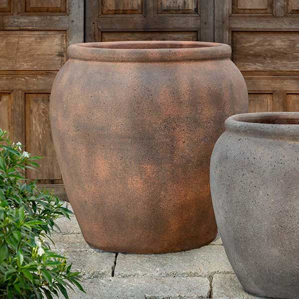 Kampala Jar Planter 29 inch - Sandblasted - S/1 on concrete in the backyard