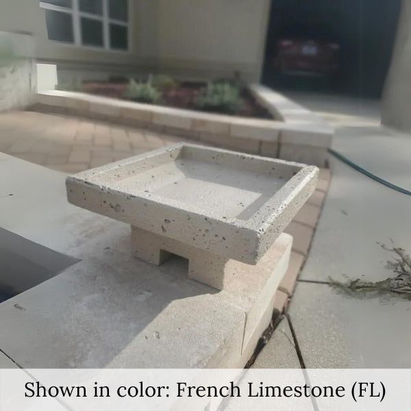 Kosei Birdbath in french limestone in the backyard, sideview