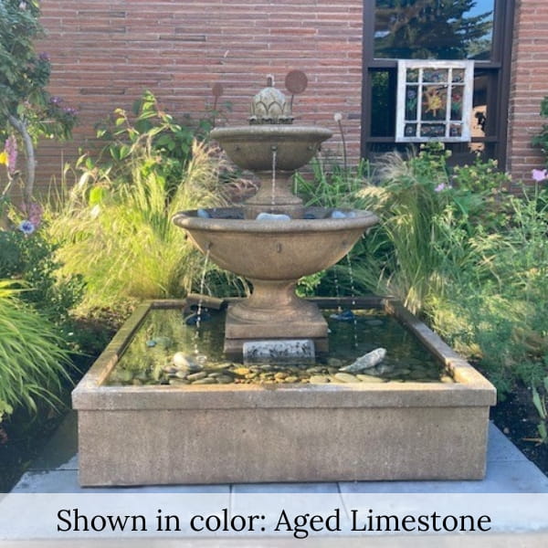 La Mirande Fountain running on patio in the garden oasis.