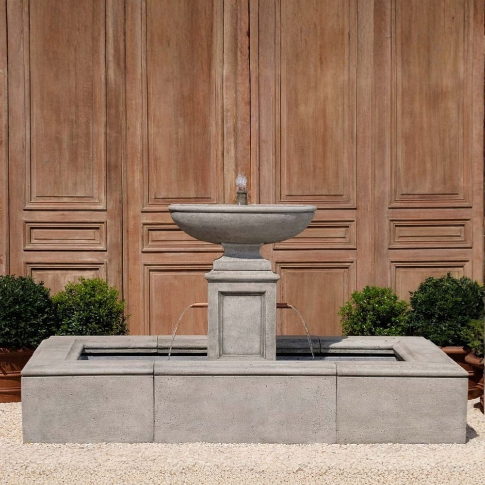 La Riviere Fountain on gravel in the backyard