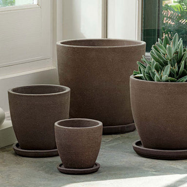 Lara Planter - Carob - S/4 on concrete filled with plants