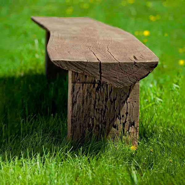 Large Bois Bench on grass in the backyard sideview