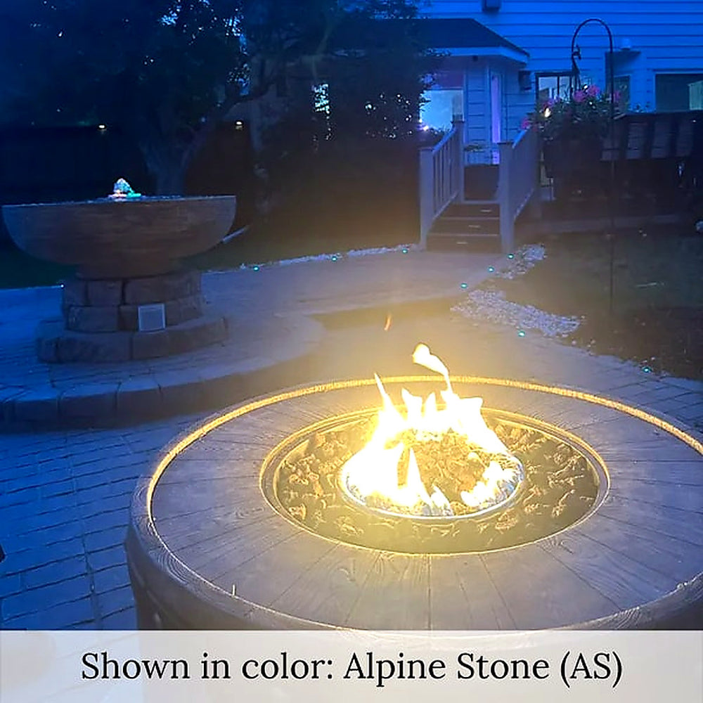 Large Girona Fountain in action near fireplace
