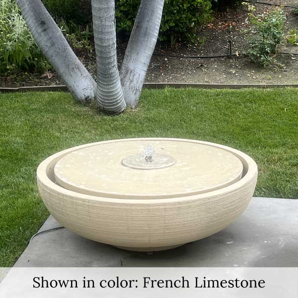 Large Girona Fountain in French LImestone in the backyard upclose.