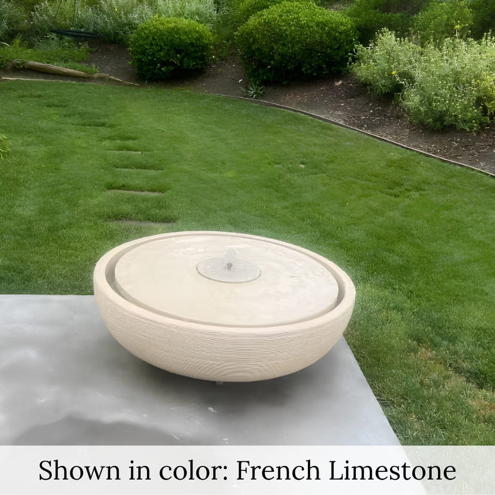 Large Girona Fountain in French Limestone in the backyard.