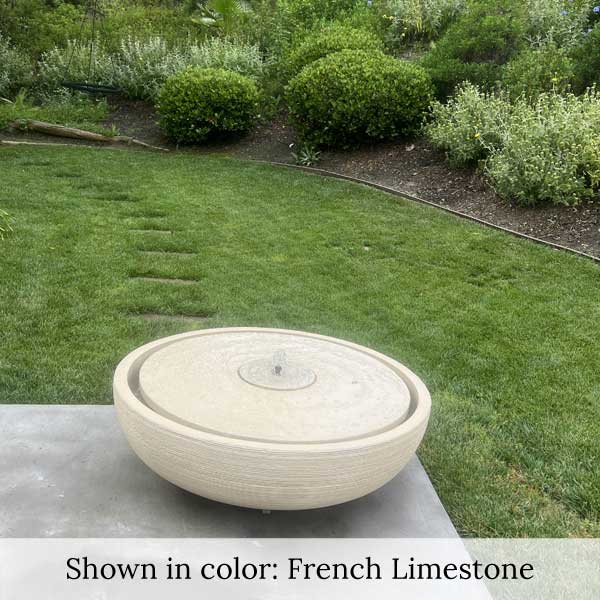 Large Girona Fountain in French Limestone in the backyard.