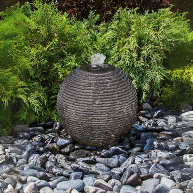 Large Ribbed Black Sphere Fountain Kit on black peebles in action