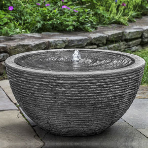 Large Stone Ledge Arroyo Garden Bubbler fountain in action on patio