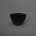 Lima Square Tapered Fiberglass Planter in matte black against gray background.