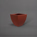 Lima Square Tapered Fiberglass Planter in matte terra cotta against gray background.