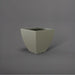 Lima Square Tapered Fiberglass Planter in satin beige against gray background.