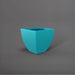 Lima Square Tapered Fiberglass Planter in satin seafoam green against gray background.