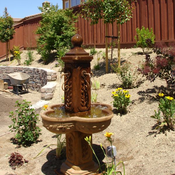 Limone Courtyard Fountain in action in the backyard.