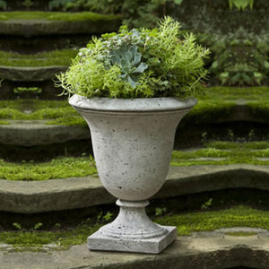 Linwood Urn on stairs in the backyard