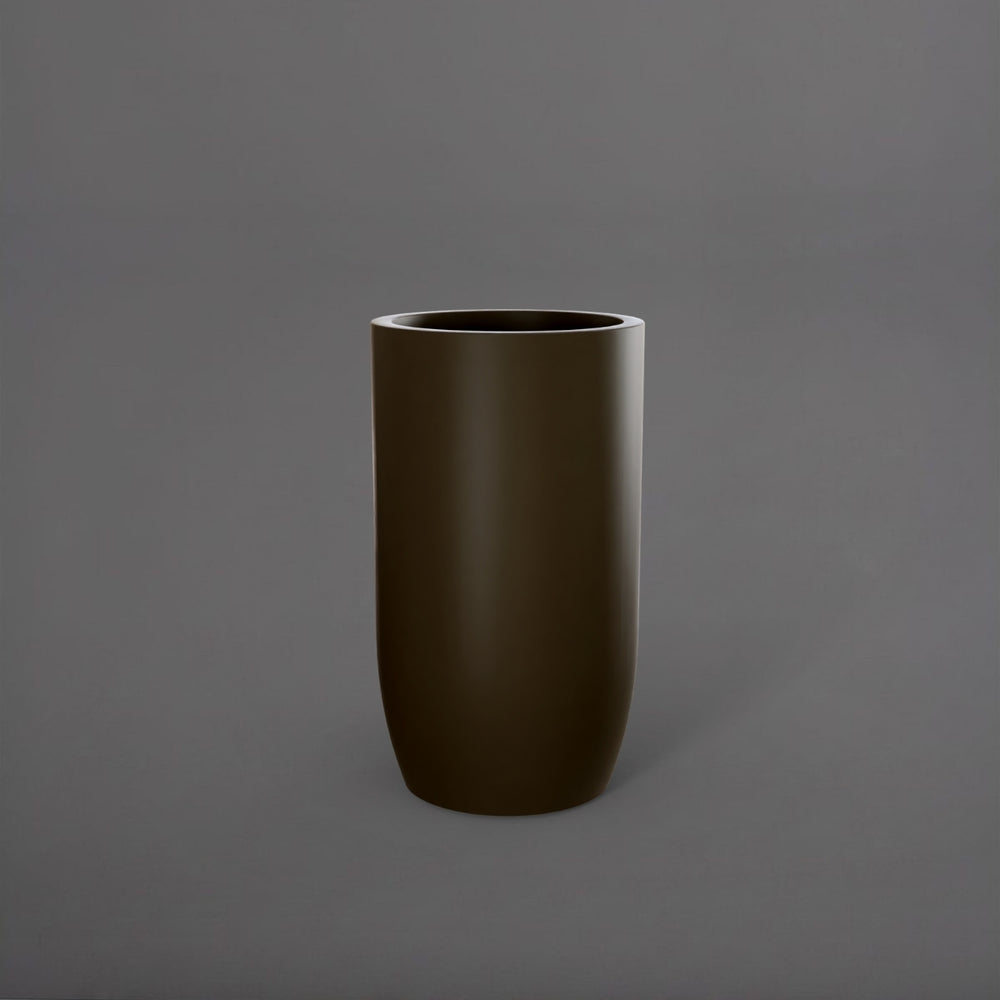 Lisbon Tall Round Tapered Fiberglass Planter in matte bronze against gray background.