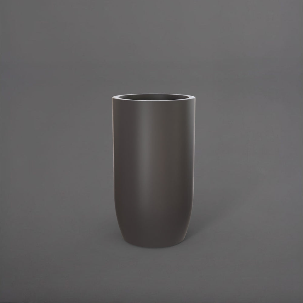 Lisbon Tall Round Tapered Fiberglass Planter in matte cement grey against gray background.