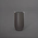 Lisbon Tall Round Tapered Fiberglass Planter in matte cement grey against gray background.