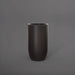 Lisbon Tall Round Tapered Fiberglass Planter in matte charcoal against gray background.