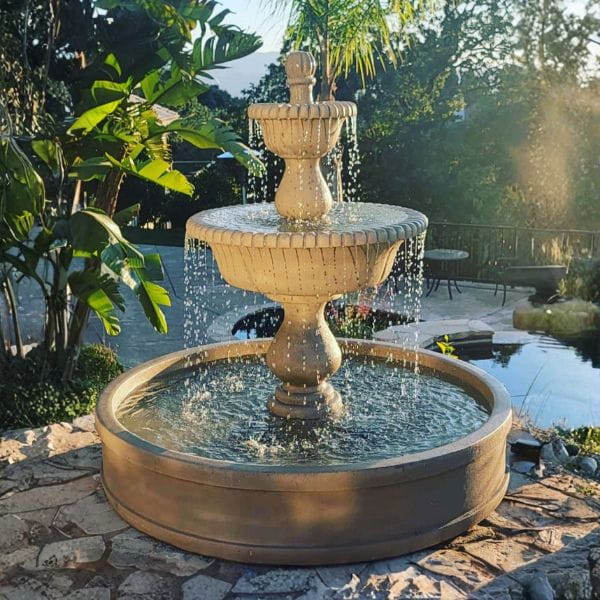 Malibu Two Tier Pond Fountain on concrete in action.