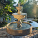Malibu Two Tier Pond Fountain on concrete in action.