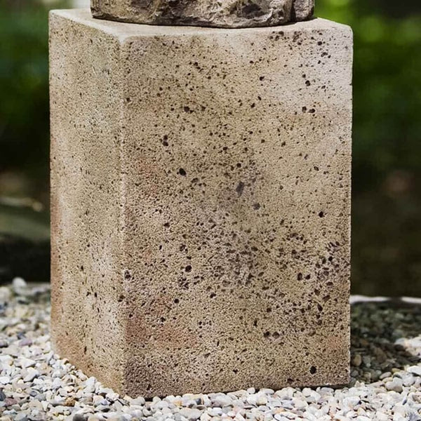 Medium Art Pedestal on gravel in the backyard