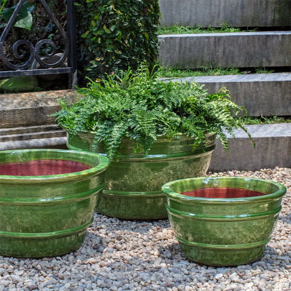 Mera Planter in Brunello on concrete in the backyard.