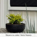 Mesa Large Planter on gravel against white wall.
