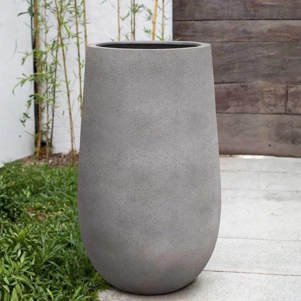 Mews Planter, Large in stone grey lite on concrete in the backyard.