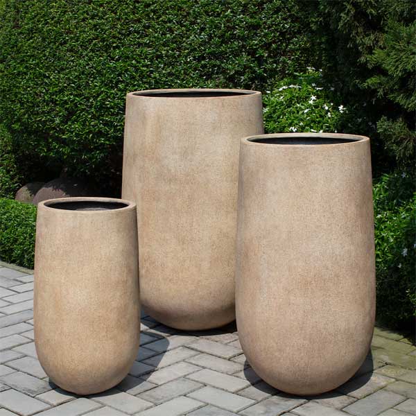 Mews Planter, Medium in terra antique lite on concrete in the backyard.