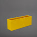 Miami Rectangle Fiberglass Planter in gloss saffron against gray background.