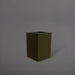 Miami Short Corner Fiberglass Planter in matte bronze against gray background.