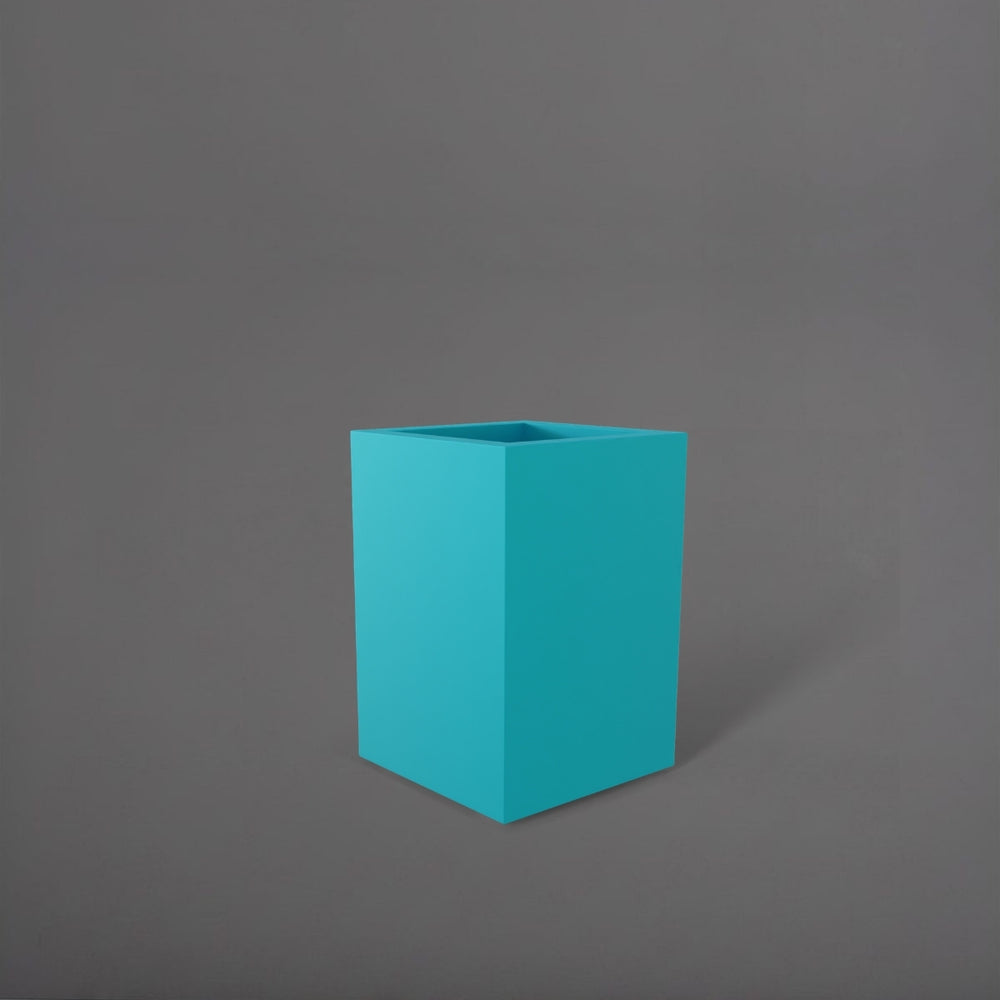 Miami Short Corner Fiberglass Planter in satin seafoam green against gray background.