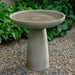 Midford Birdbath on gravel in the backyard.