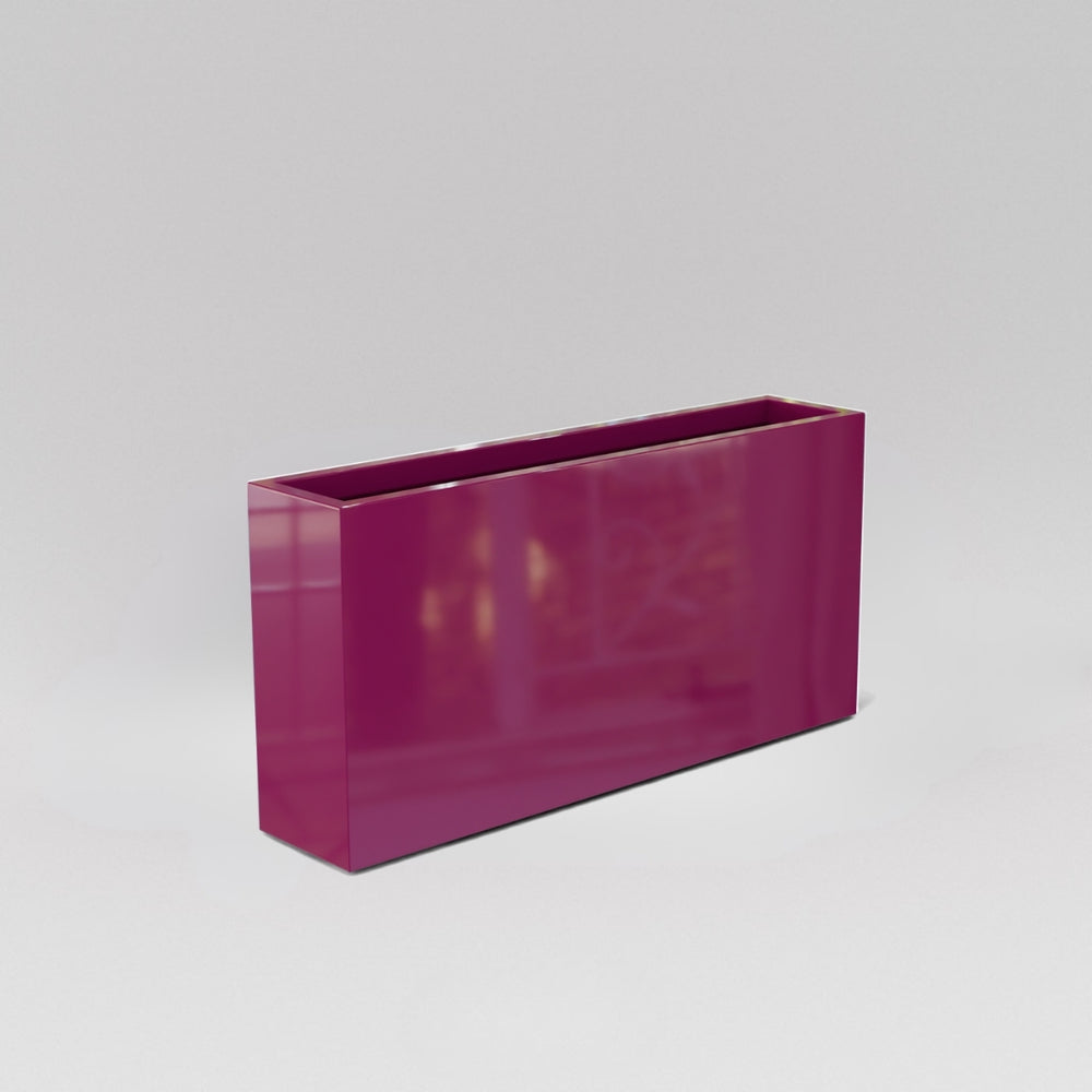 Milano Narrow Rectangle Planter in gloss eggplant against gray background.