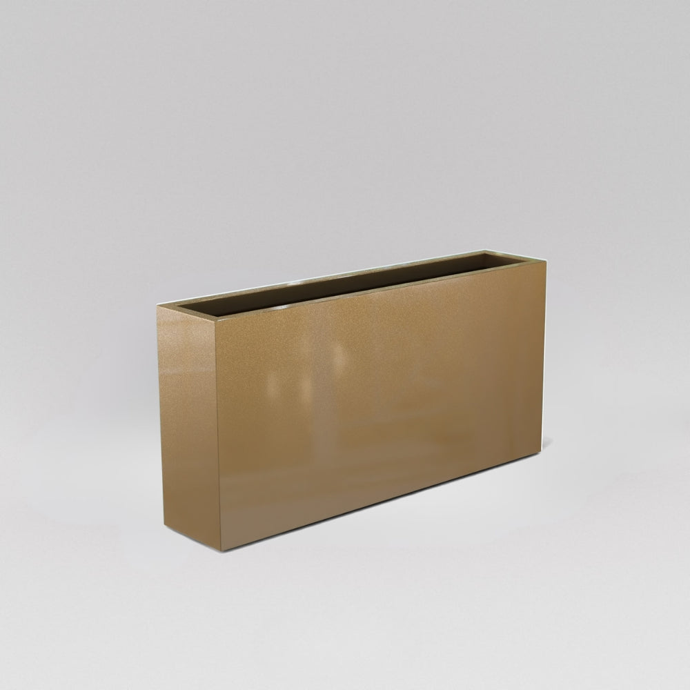 Milano Narrow Rectangle Planter in gloss metallic gold against gray background. 